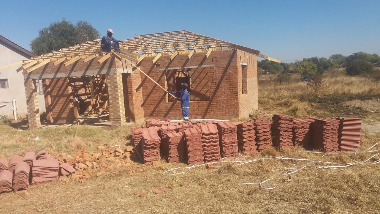 Roofing Timber Trusses & Red Concrete Tiles